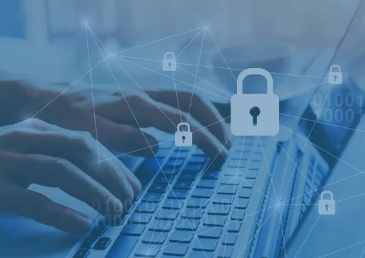 Hands typing on a laptop keyboard with digital padlock icons and network connections representing online security and fraud protection.